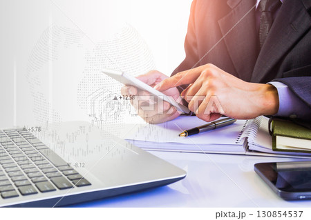 Stock market or forex trading graph and candlestick chart suitable for financial investment concept. Economy trends background for business idea and all art work design. Abstract finance background. Stock market or forex trading graph and candlestick chart suitable for financial investment concept. Economy trends background for business idea and all art work design. Abstract finance background. 130854537