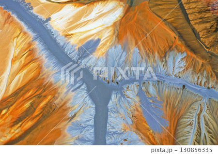 Patterns of acid mine drainage in decanting lake, nature pollution, aerial view 130856335