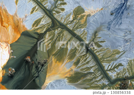 Patterns of acid mine drainage in decanting lake, nature pollution, aerial view 130856338