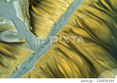 Patterns of acid mine drainage in decanting lake, nature pollution, aerial view Patterns of acid mine drainage in decanting lake, nature pollution, aerial view 130856344