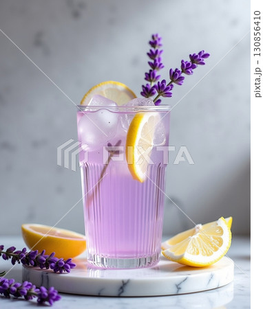 Refreshing Lavender Lemonade Glass with Ice Cubes and Garnish Still Life 130856410