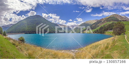 Panorama of Vernagt reservoir with alpine mountains South Tyrol Italy Panorama of Vernagt reservoir with alpine mountains South Tyrol Italy 130857166