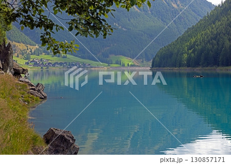 Vernagt reservoir with turquoise water and mountains South Tyrol Italy 130857171