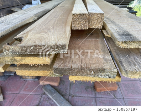 Pine lumber wooden boards for construction Pine lumber wooden boards for construction 130857197