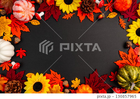 Autumn Border with Pumpkins, Sunflowers, and Felt Leaves 130857965