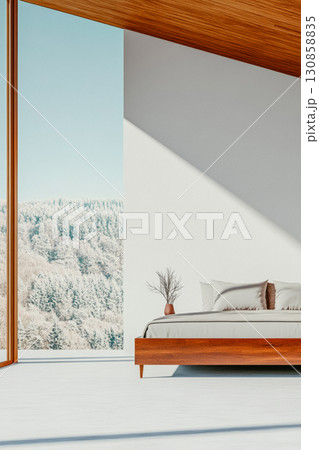Minimalist bedroom with panoramic view of snowy landscape during winter season 130858835