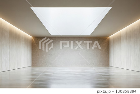 Minimalist interior design featuring a spacious room with natural lighting from above 130858894