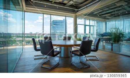 Modern conference room with round wooden table and leather chairs in glass office, contemporary corporate workspace with city view Modern conference room with round wooden table and leather chairs in glass office, contemporary corporate workspace with city view 130859365