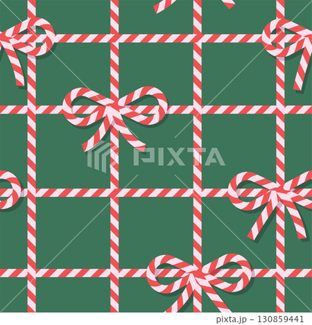 Christmas seamless pattern with red and white striped ribbon and bows. Sweet background with candy cane grid. Perfect for seasonal gift paper, textile, celebration design. Vector flat illustration 130859441