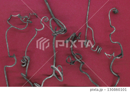 Abstract background of dry grape curled tendrils 130860101