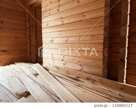 Construction of a house from rounded logs. Ecological house. High quality photo Construction of a house from rounded logs. Ecological house. High quality photo 130860127