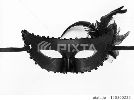 Inner side of black carnival mask on white background 130860226
