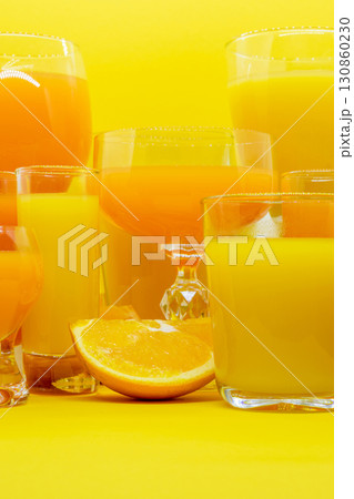 Juice in various shape glasses Juice in various shape glasses 130860230