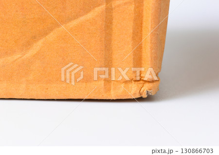 wrinkle brown cardboard box texture isolated on white background 130866703