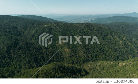 Aerial view of green mountain ridges and forested valleys in Divcibare, Serbia 130874306