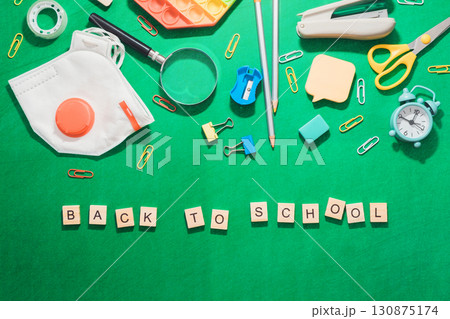 Back to school is written on a green background Back to school is written on a green background 130875174