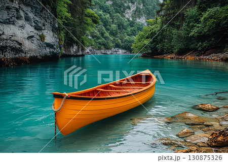Yellow canoe is floating in a blue river 130875326