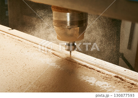 CNC milling machine. Machine tool in wood factory with drilling machines. CNC milling machine. Machine tool in wood factory with drilling machines. 130877593