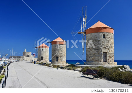 Rhodes windmills. Beautiful concept for travel and vacation in Greece. Rhodes windmills. Beautiful concept for travel and vacation in Greece. 130878211
