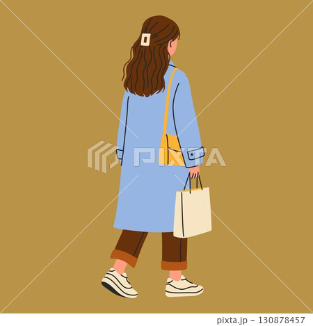 Fashionable Girl from Back Holding Shopping Bag Fashionable Girl from Back Holding Shopping Bag 130878457