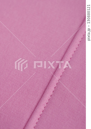 Pink fabric with neat stitching. Cotton. Pink fabric with neat stitching. Cotton. 130880121