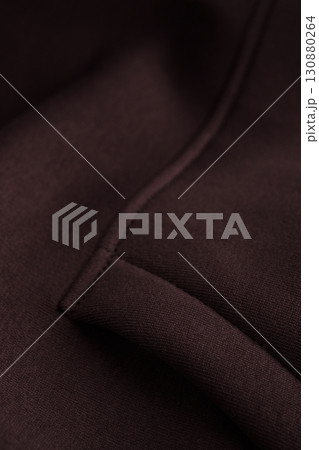 Dark brown fabric with neat stitching. Sweatshirt pocket. Cotton. Dark brown fabric with neat stitching. Sweatshirt pocket. Cotton. 130880264