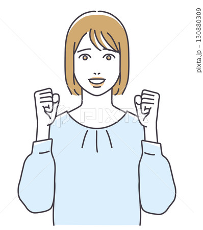 ガッツポーズするブラウス姿の若い女性 130880309