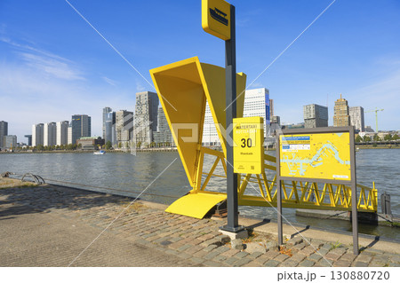 Rotterdam, the Netherlands. 06.09.2025, Water taxi in Rotterdam at the Maaskade pier with a view of the Willemsbrug bridge Rotterdam, the Netherlands. 06.09.2025, Water taxi in Rotterdam at the Maaskade pier with a view of the Willemsbrug bridge 130880720