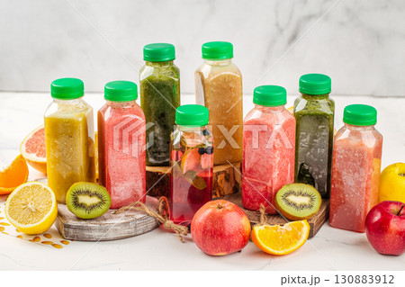 Assorted fresh fruit smoothies in plastic bottles 130883912