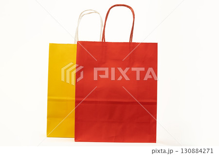Red and yellow shopping bag on white blackground Red and yellow shopping bag on white blackground 130884271