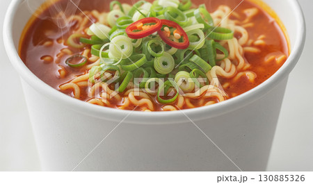Spicy Korean Instant Cup Ramen with Scallions and Chili 130885326
