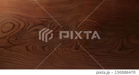 テーブル板の茶褐色の木目がきれいに浮き出た横長の背景画像 130886470