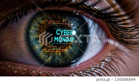 An extreme closeup of a human eye, showcasing a digital reflection of bright blue Cyber Monday text and orange code within the pupil, symbolizing online commerce and technology. 130886894