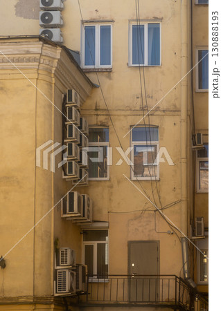 Air conditioners on the facade of the house, ventilation and cooling system. Air conditioners on the facade of the house, ventilation and cooling system. 130888193
