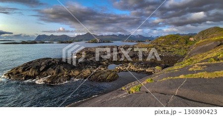 Coastal Landscape With Old Nickel Mine And Red Cottage On Senja Island At Vesteralen In Norway Coastal Landscape With Old Nickel Mine And Red Cottage On Senja Island At Vesteralen In Norway 130890423