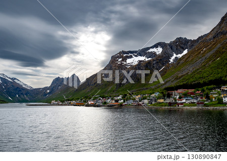 Harbor Of Village Gryllefjord With Ferry Terminal To Andenes On Senja Island At Vesterales In Norway Harbor Of Village Gryllefjord With Ferry Terminal To Andenes On Senja Island At Vesterales In Norway 130890847