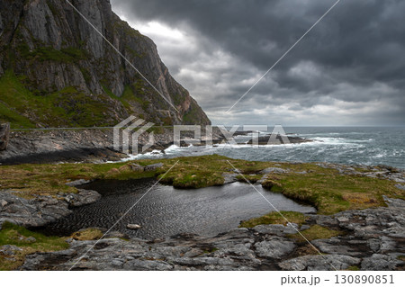 Spectacular Coast With Coastal Road On Andoya Island Of Lofoten In Norway Spectacular Coast With Coastal Road On Andoya Island Of Lofoten In Norway 130890851