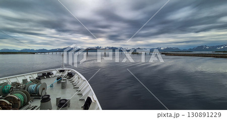 Cruise Ship Approaches High Bridge In The City Stokmarknes At The Lofoten In Norway 130891229
