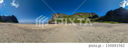 Kvalvika Sand Beach With Mountains And Ocean On Lofoten Islands In Norway Kvalvika Sand Beach With Mountains And Ocean On Lofoten Islands In Norway 130891562