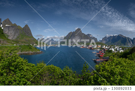 Village Reine With Mountains And Gravdalsbukta Near Reinebringen On Lofoten Islands In Norway Village Reine With Mountains And Gravdalsbukta Near Reinebringen On Lofoten Islands In Norway 130892033