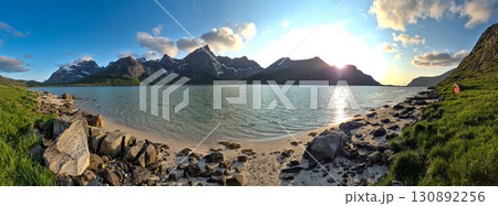 White Sand Beach And Snowy Mountains At Calm Fjord Near Leknes On Lofoten Islands In Norway 130892256