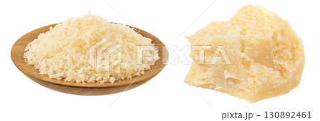 grated parmesan cheese in wooden bowl isolated on white background 130892461
