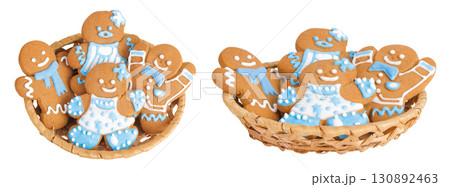 christmas gingerbread cookie in a wicker basket isolated on white background 130892463