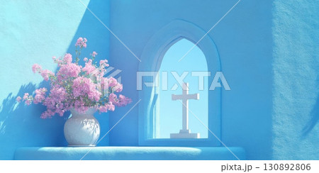 Pink flowers with cross, and blue wall. Pink flowers with cross, and blue wall. 130892806