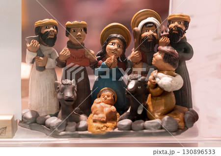 Clay figurines of Joseph, Mary,Jesus and magi Christmas creche 130896533