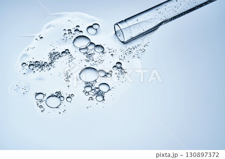 A test tube with spilled serum. Demonstration of the texture. A test tube with spilled serum. Demonstration of the texture. 130897372