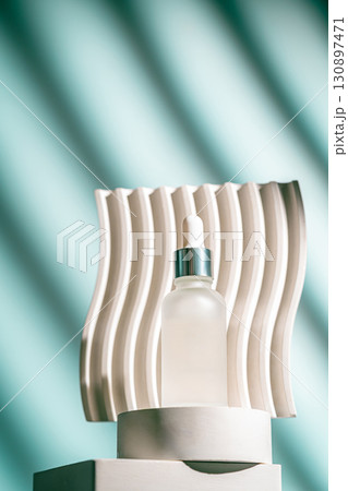 A frosted dropper bottle of facial serum A frosted dropper bottle of facial serum 130897471