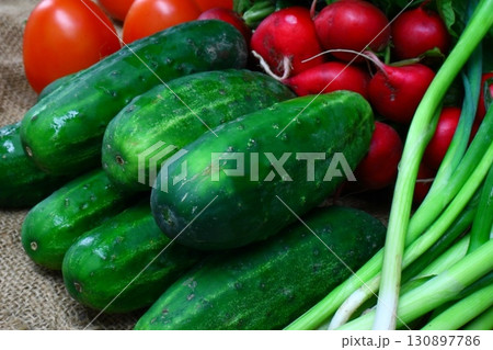 Fresh vegetables radish cucumber tomatoes Fresh vegetables radish cucumber tomatoes 130897786