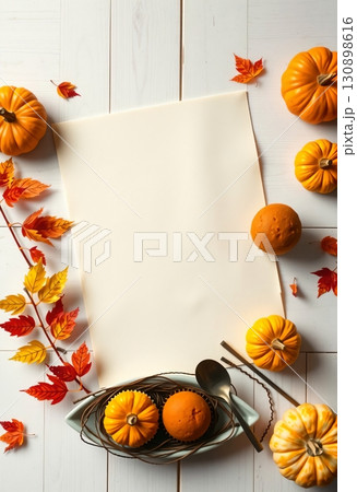 Natural pumpkins and leaves on bright wooden festive background Natural pumpkins and leaves on bright wooden festive background 130898616