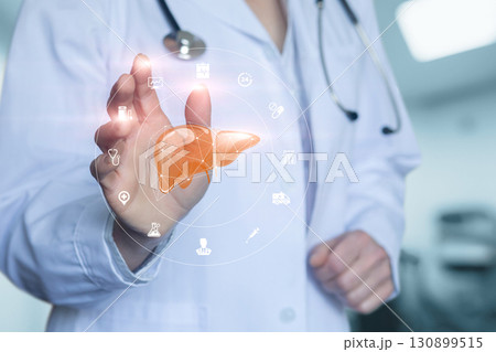 Healthcare professional interacting with digital liver model. 130899515